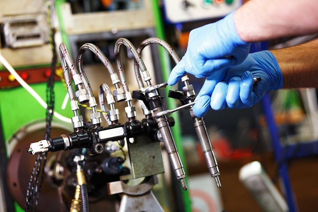 Diesel common rail injectors on the workshop bench